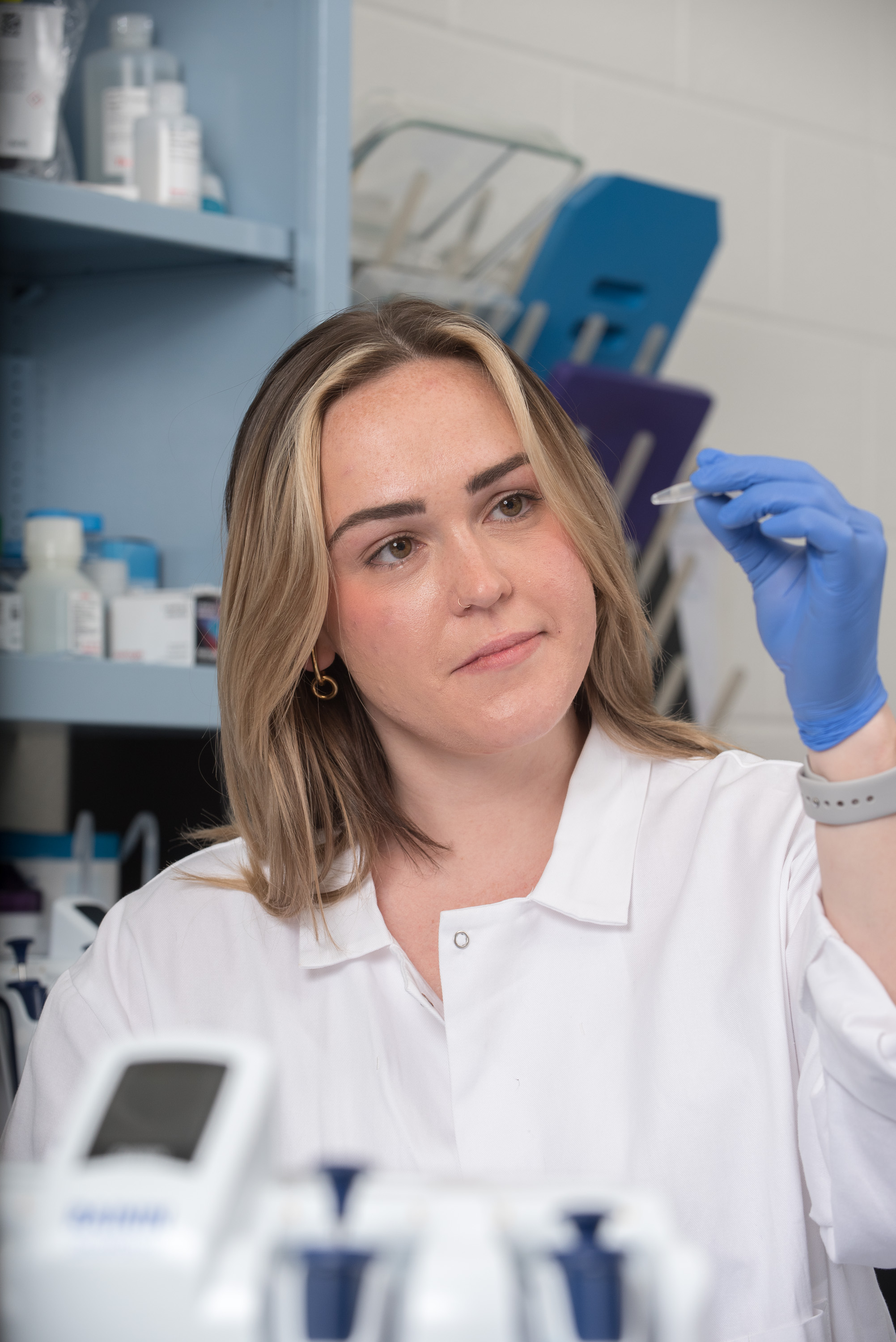 Researcher in white coat